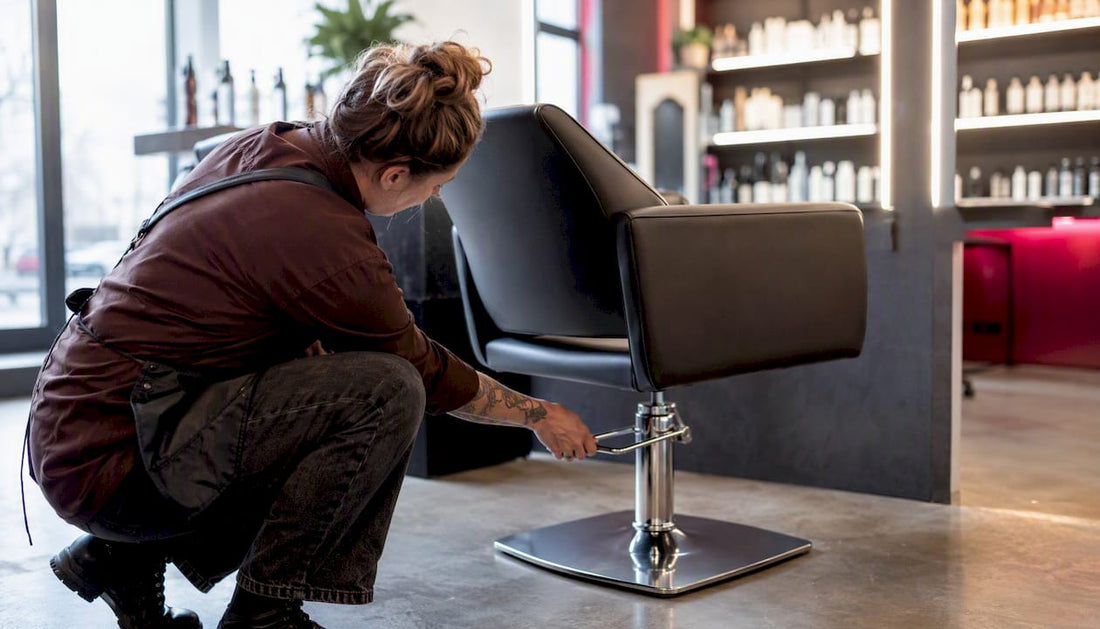 Hand pumping hydraulic lift on salon chair